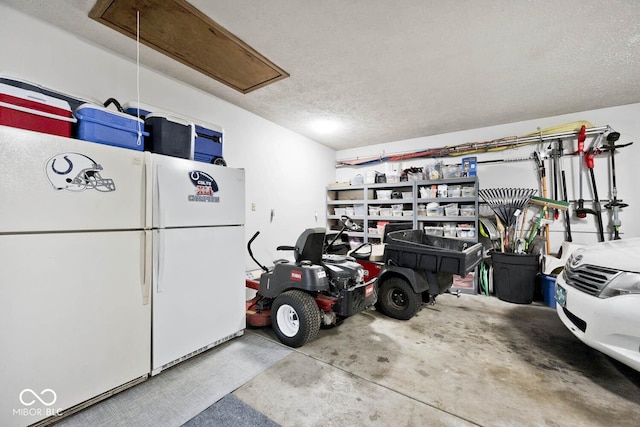 garage featuring white refrigerator