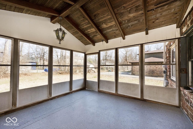 unfurnished sunroom with wooden ceiling and lofted ceiling with beams