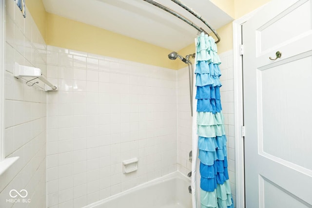 full bath featuring shower / tub combo with curtain