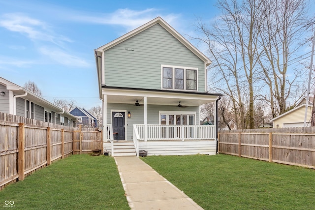 view of front of property featuring covered porch, ceiling fan, and a front lawn