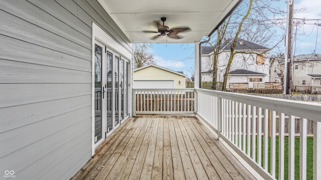 wooden deck featuring ceiling fan