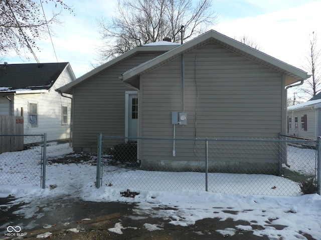 view of snow covered property