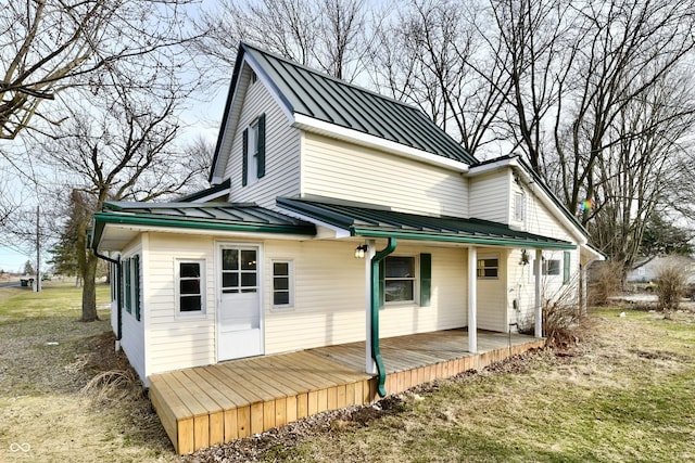 rear view of house with a porch