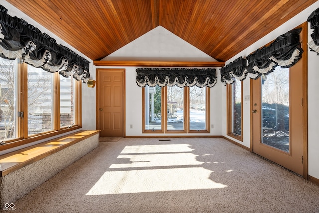 unfurnished sunroom with wood ceiling and vaulted ceiling