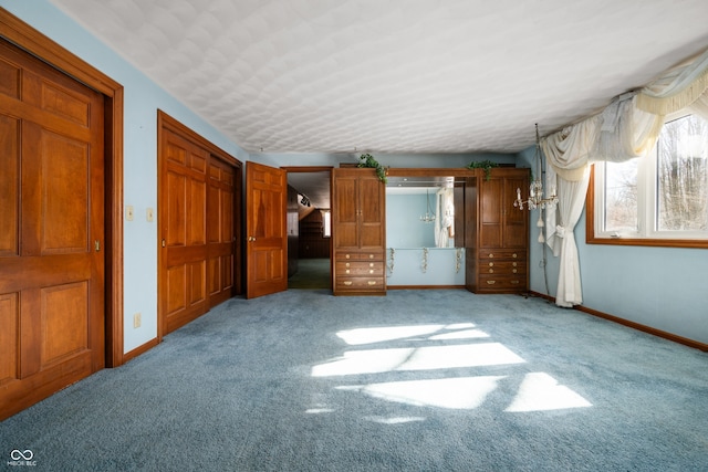 unfurnished bedroom with light colored carpet