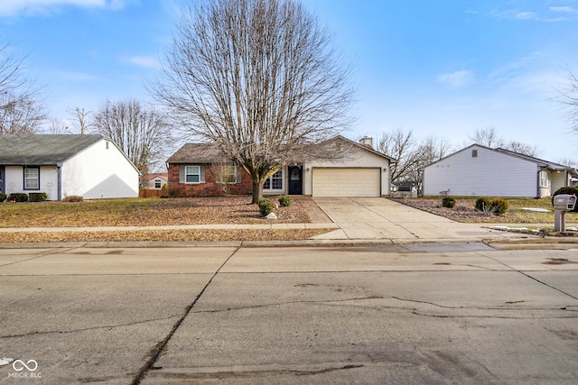 ranch-style home with a garage