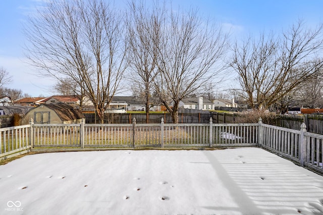 wooden deck with a shed