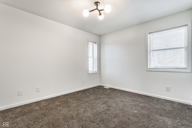 spare room with carpet flooring