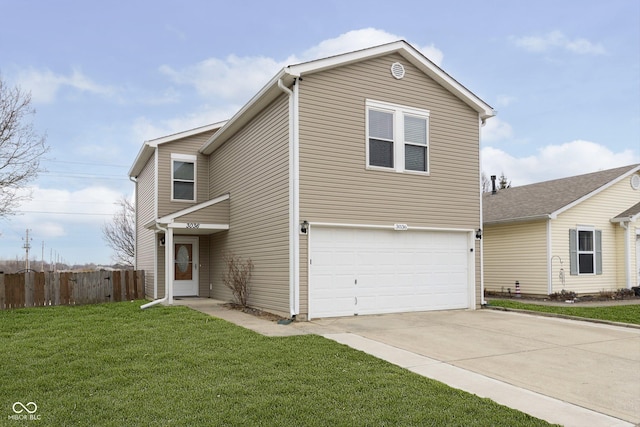 view of front of home featuring a garage and a front yard