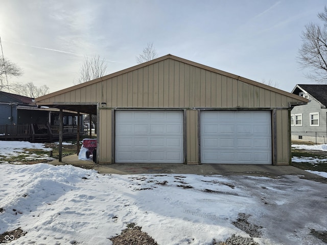 view of snow covered garage