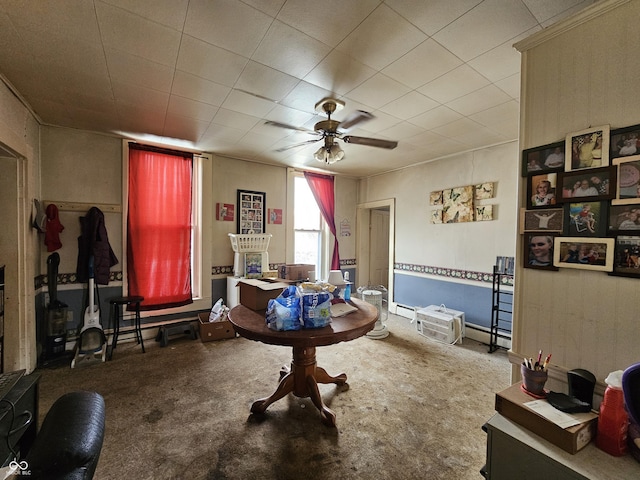 carpeted living room featuring ceiling fan