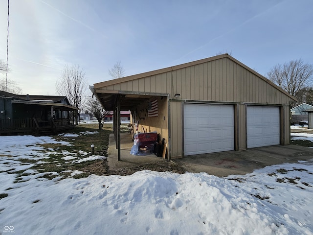 view of snow covered garage