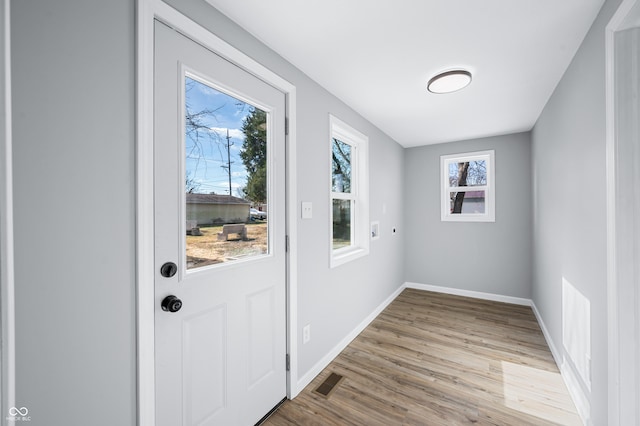 doorway featuring light wood-type flooring