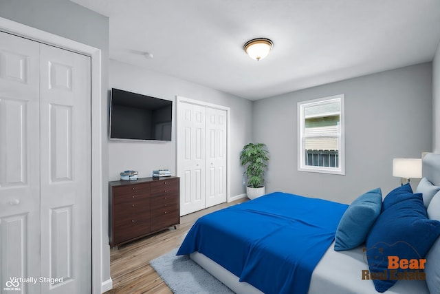 bedroom with light wood-type flooring