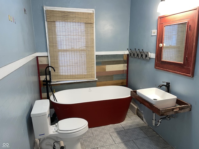 bathroom with a bathtub and toilet