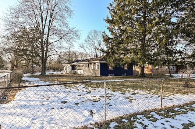 view of snow covered house