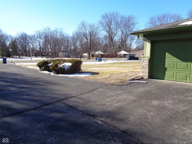 view of yard with a garage