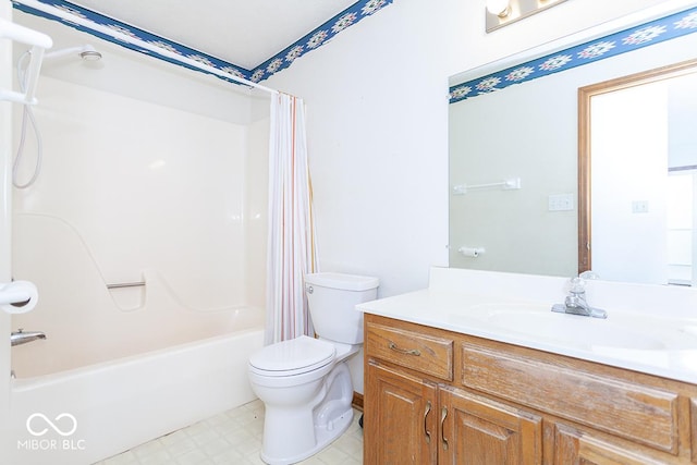 full bathroom featuring toilet, vanity, and shower / bath combo with shower curtain