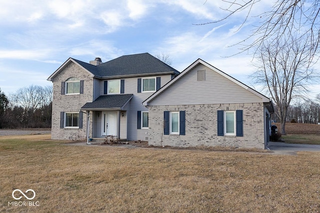 view of front facade with a front yard