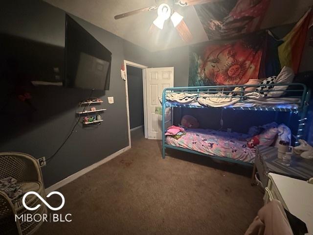 bedroom featuring carpet and ceiling fan