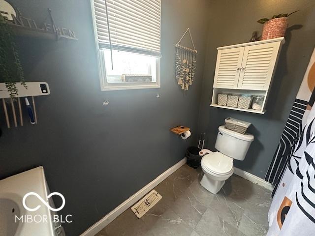 bathroom featuring toilet