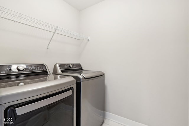 washroom featuring separate washer and dryer