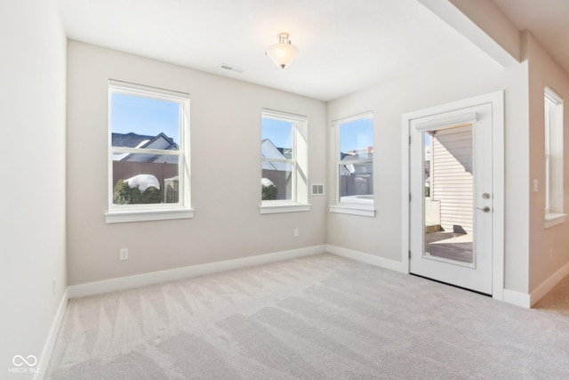 view of carpeted spare room