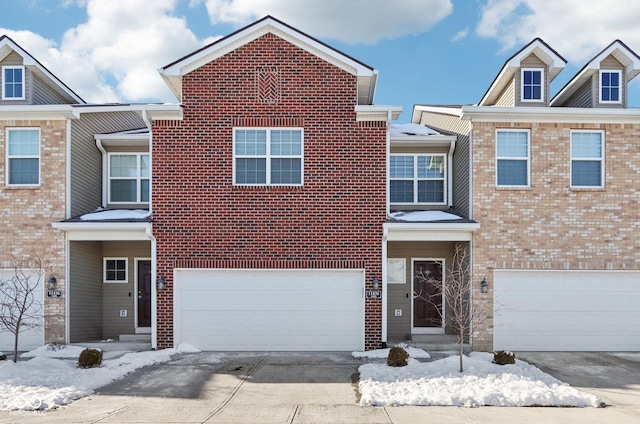 multi unit property featuring a garage