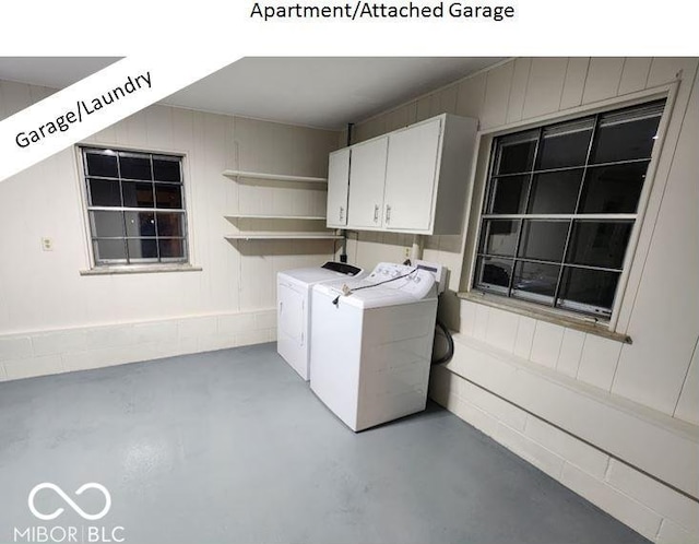 laundry area with cabinets and washer and dryer