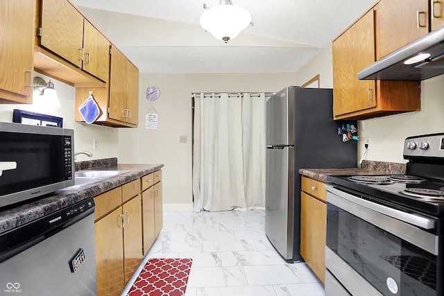 kitchen with appliances with stainless steel finishes and sink