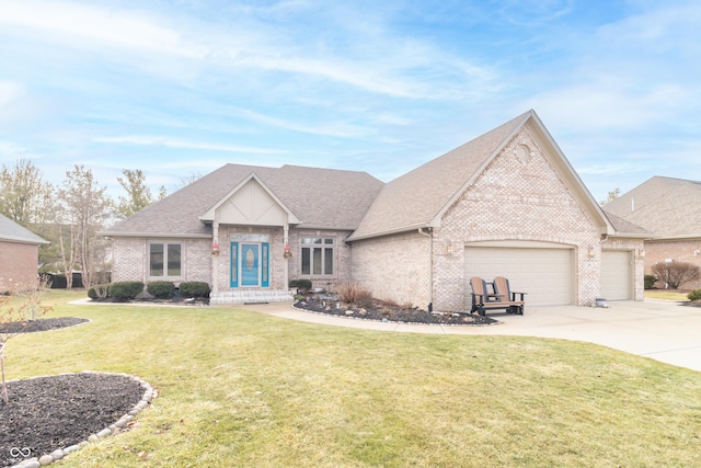 view of front of home featuring a garage and a front yard