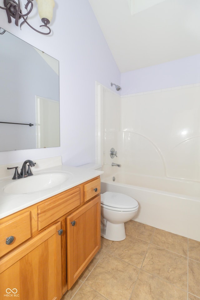 full bathroom with shower / tub combination, tile patterned flooring, vanity, vaulted ceiling, and toilet