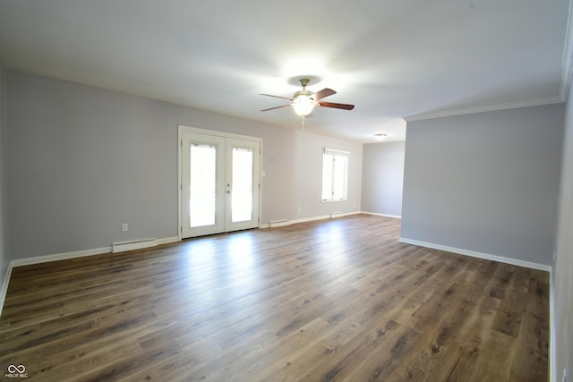 empty room with french doors, dark wood-type flooring, ornamental molding, ceiling fan, and a baseboard heating unit