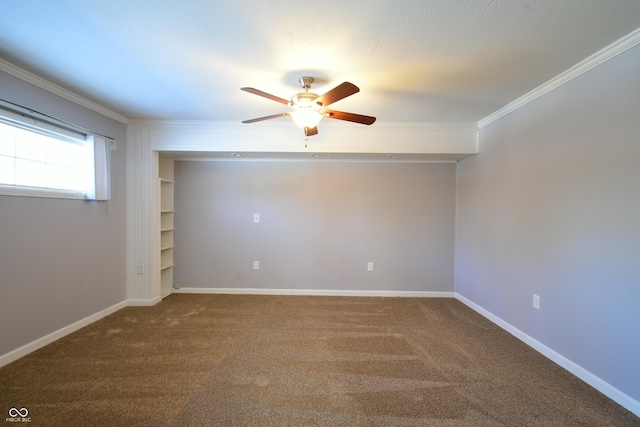 carpeted empty room with ceiling fan and ornamental molding