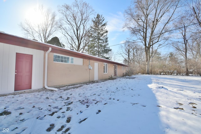 view of snow covered property