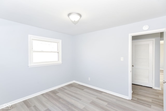 unfurnished room featuring light hardwood / wood-style flooring