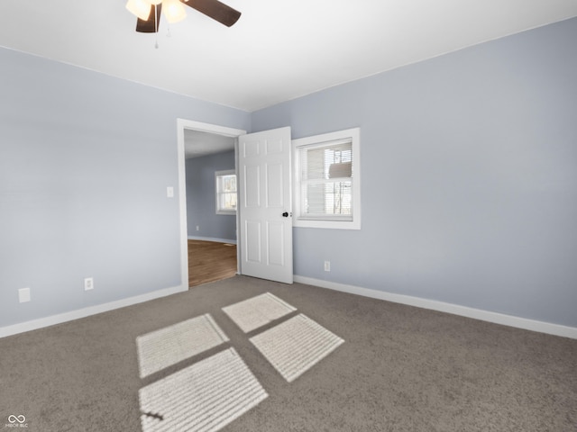 unfurnished room featuring carpet flooring and ceiling fan