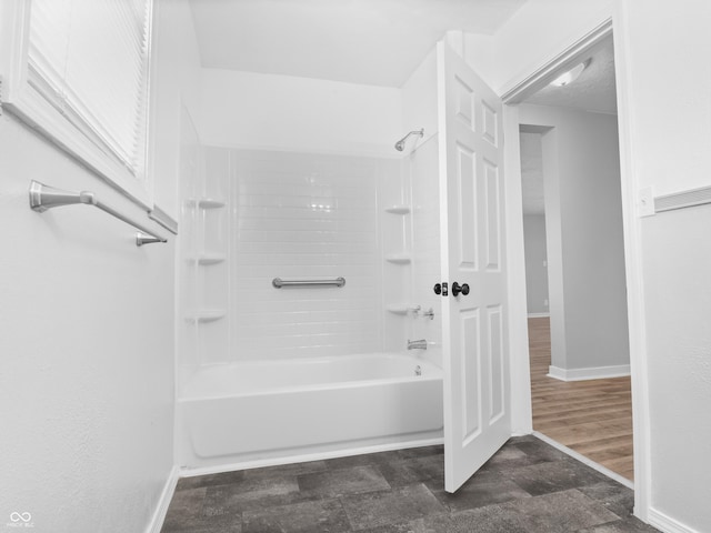 bathroom with shower / bathtub combination