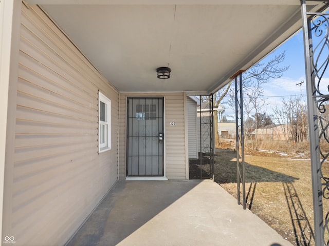 property entrance with a patio