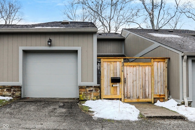 exterior space with a garage