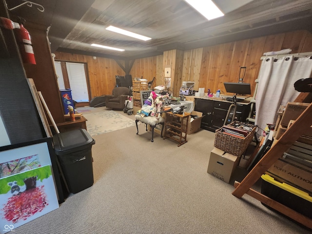 basement with wood walls and carpet