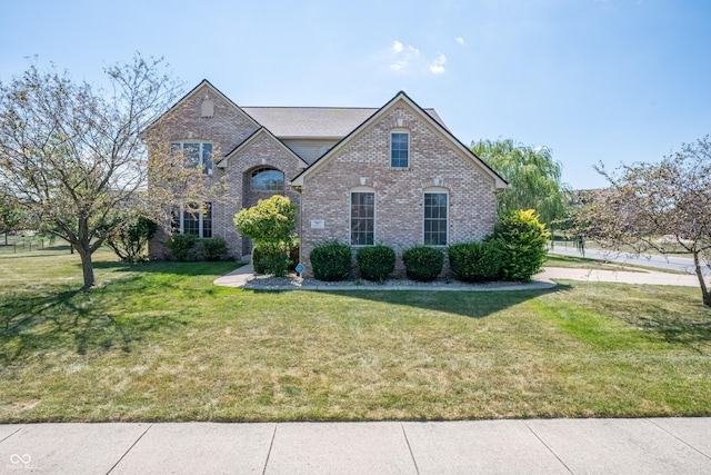 view of front of house with a front lawn