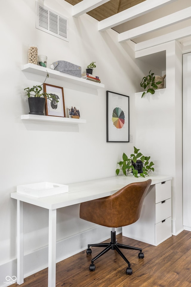 office area featuring beam ceiling and dark hardwood / wood-style flooring