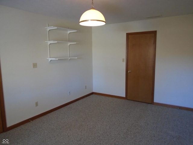 unfurnished room with carpet flooring