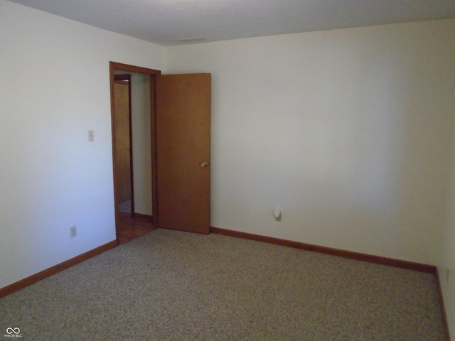 view of carpeted spare room