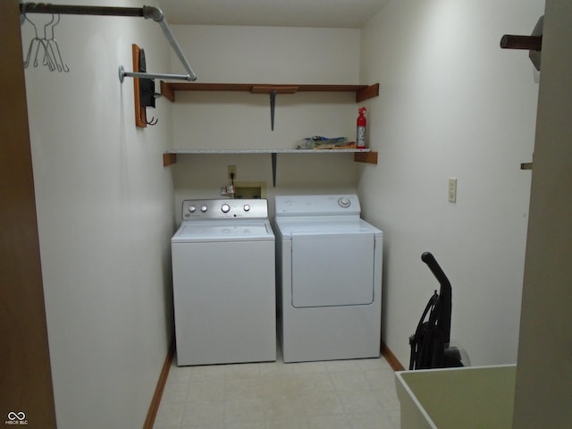 washroom with washer and clothes dryer