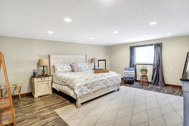 bedroom featuring dark wood-type flooring