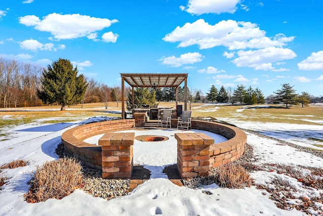 view of home's community with a fire pit