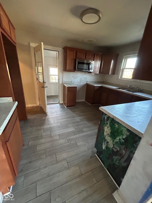 kitchen with backsplash and sink