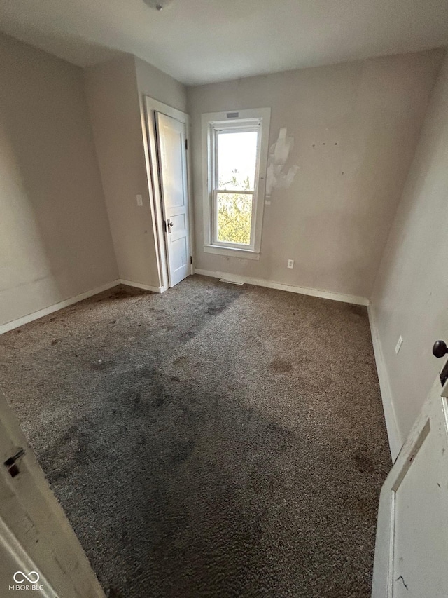 view of carpeted spare room